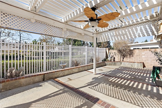 view of patio / terrace featuring ceiling fan and a pergola