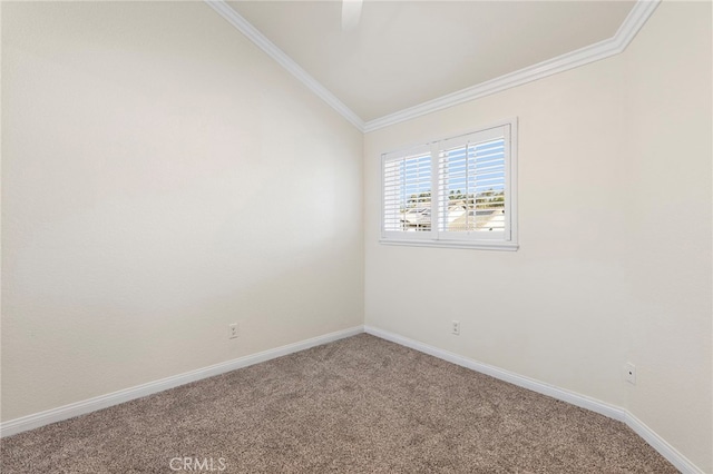 carpeted spare room with crown molding and lofted ceiling