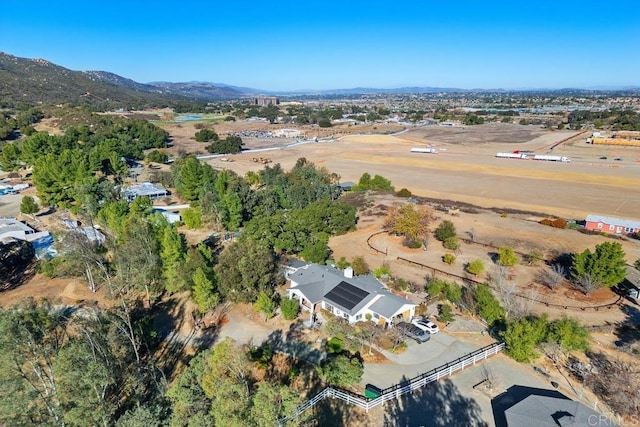 drone / aerial view featuring a mountain view