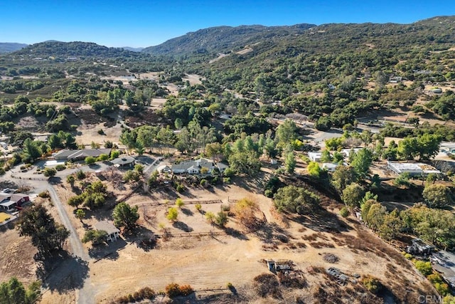 drone / aerial view featuring a mountain view