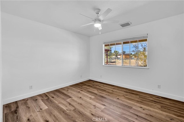 unfurnished room with light hardwood / wood-style floors and ceiling fan