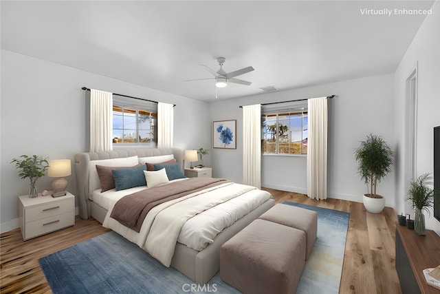 bedroom featuring wood-type flooring and ceiling fan