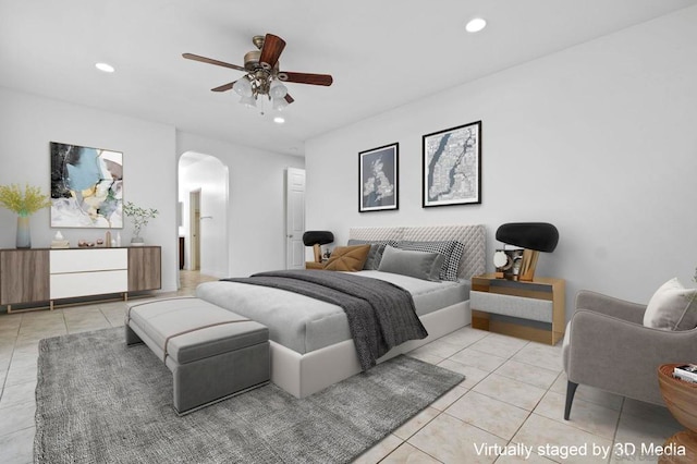 bedroom with ceiling fan and light tile patterned floors