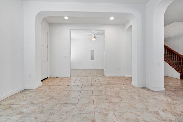 spare room featuring ceiling fan