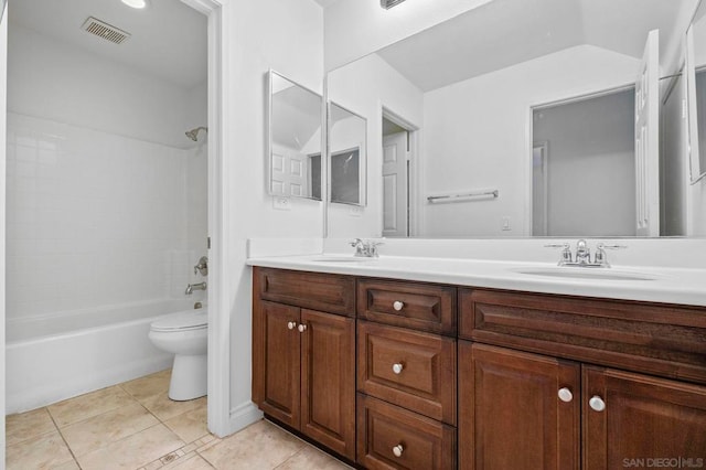 full bathroom with shower / bathtub combination, vanity, tile patterned floors, and toilet