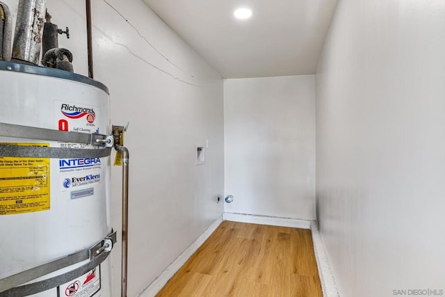 utility room with water heater