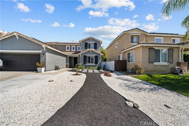 view of front of home featuring a garage and a front lawn