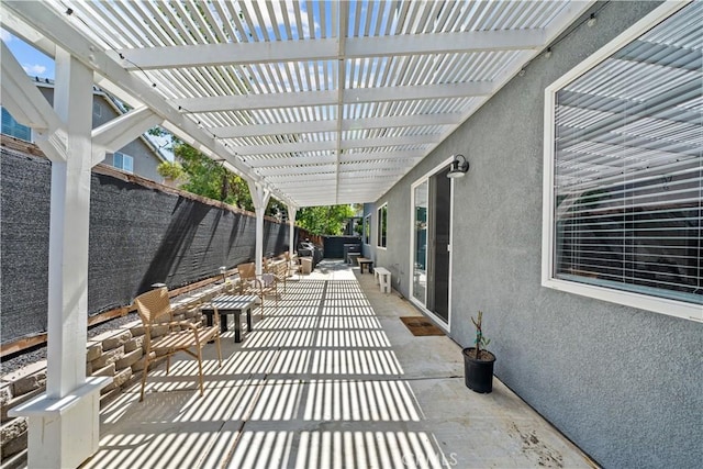 view of patio featuring a pergola