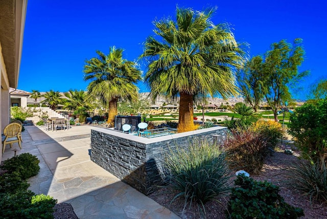 view of patio featuring a bar