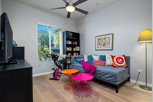 sitting room featuring ceiling fan and light hardwood / wood-style flooring