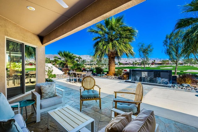 view of patio with a mountain view