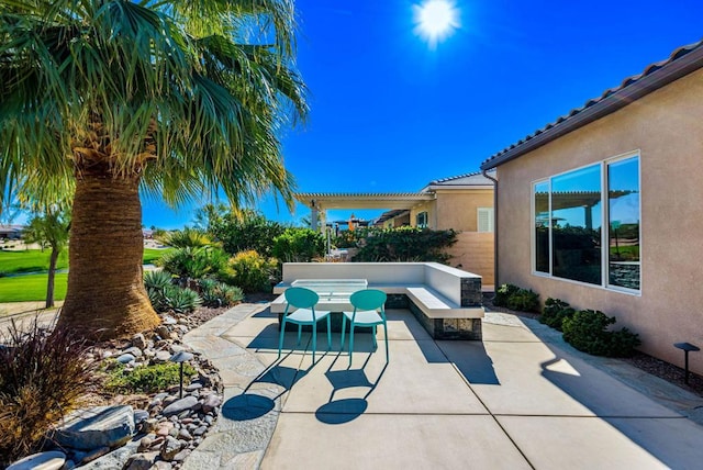 view of swimming pool featuring a pergola and a patio