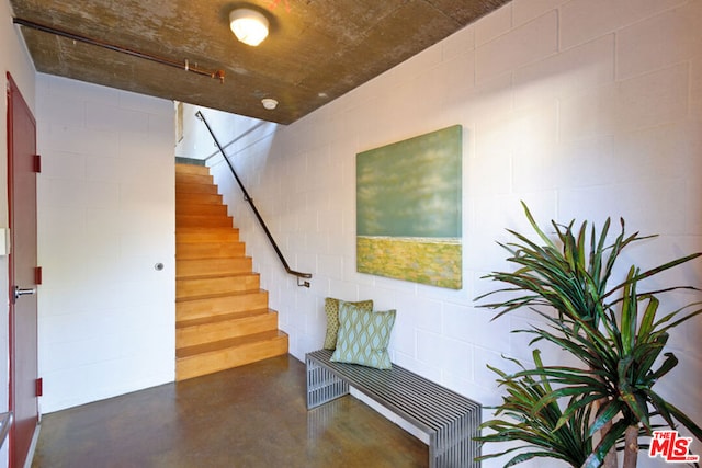 interior space featuring concrete flooring