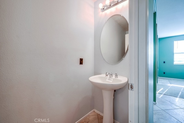 bathroom featuring tile patterned floors and sink