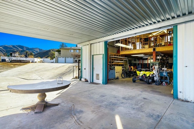 garage featuring a mountain view