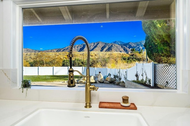 room details with sink and a mountain view