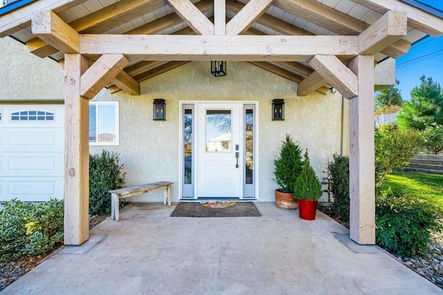 property entrance with a garage