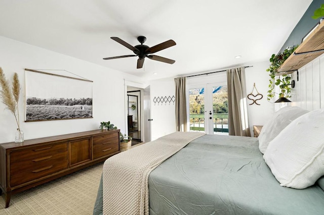 bedroom featuring french doors, ceiling fan, and access to outside