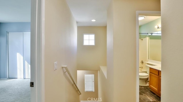 stairway with carpet flooring