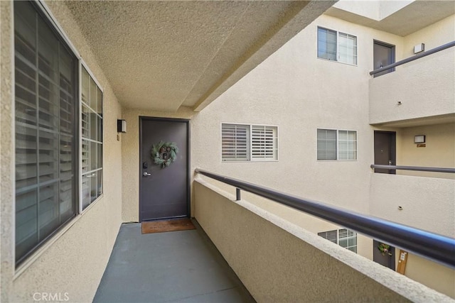 property entrance with a balcony