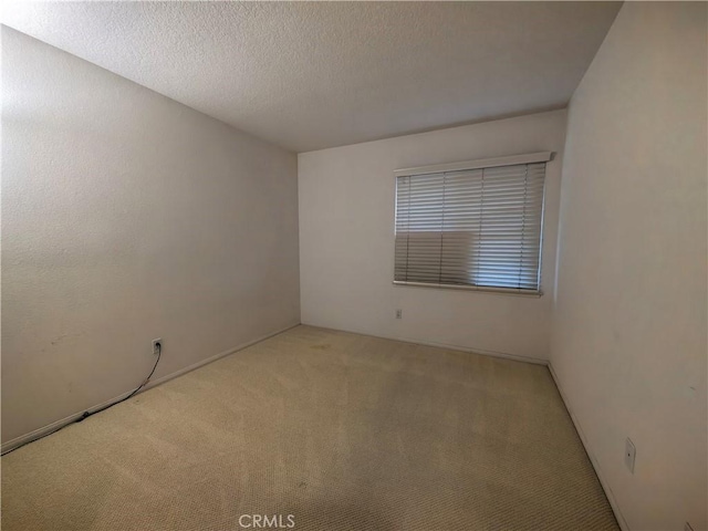 1911 E Calico Dr, West Covina, CA 91791 - carpeted spare room with a textured ceiling