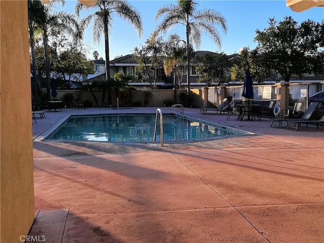 1911 E Calico Dr, West Covina, CA 91791 - community pool with a patio area and fence