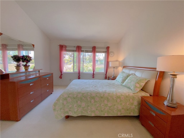 1911 E Calico Dr, West Covina, CA 91791 - bedroom featuring multiple windows and light colored carpet