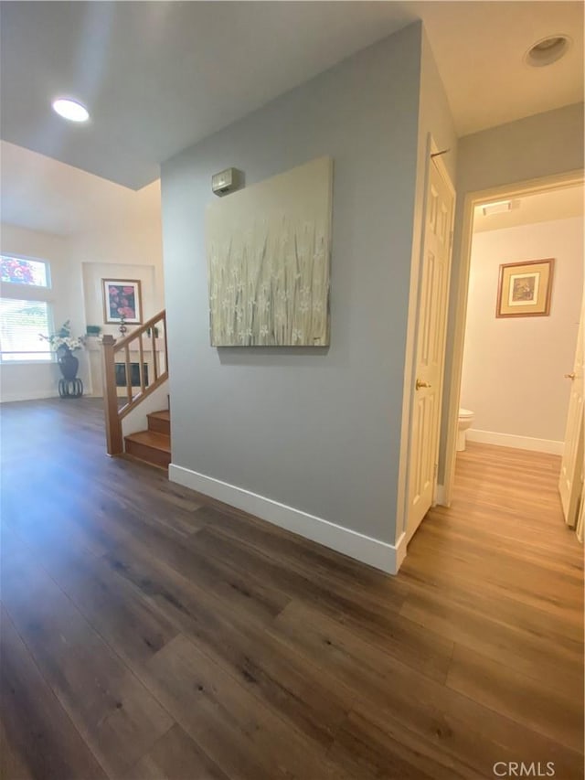 1911 E Calico Dr, West Covina, CA 91791 - hallway with wood finished floors, baseboards, stairway, and recessed lighting
