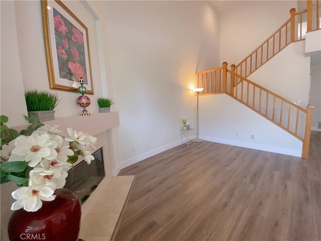 1911 E Calico Dr, West Covina, CA 91791 - living area featuring wood finished floors, stairway, and baseboards