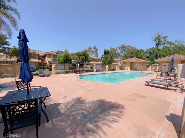 1911 E Calico Dr, West Covina, CA 91791 - community pool with a patio area and outdoor dining area