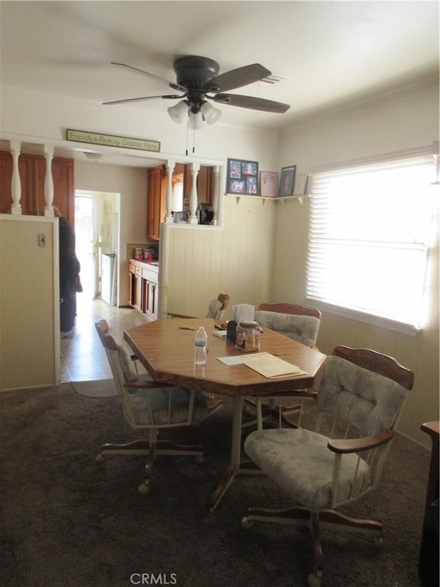 dining room featuring ceiling fan