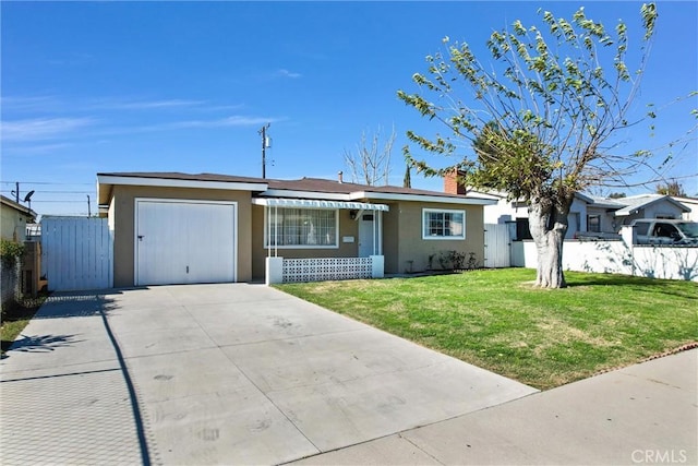 ranch-style house with a front yard and a garage