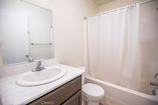 full bathroom with toilet, shower / bathtub combination with curtain, and vanity