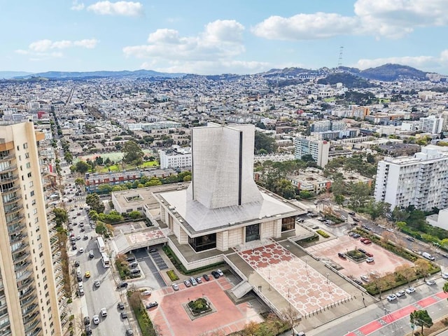 birds eye view of property featuring a mountain view