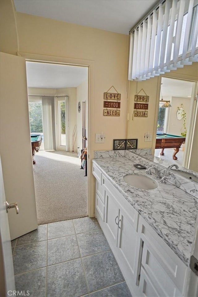 bathroom featuring vanity, tile patterned floors, and billiards