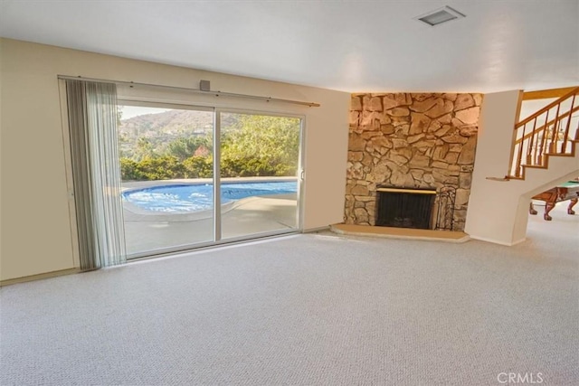 unfurnished living room with a fireplace