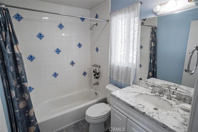 full bathroom with shower / bath combination with curtain, tile patterned floors, vanity, and toilet