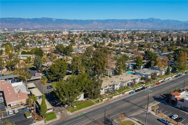 drone / aerial view featuring a mountain view