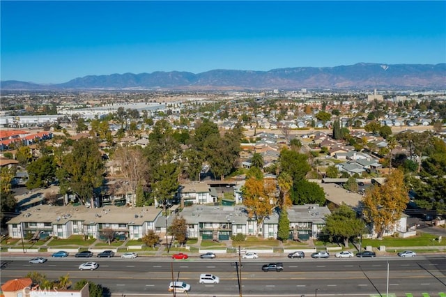 drone / aerial view featuring a mountain view