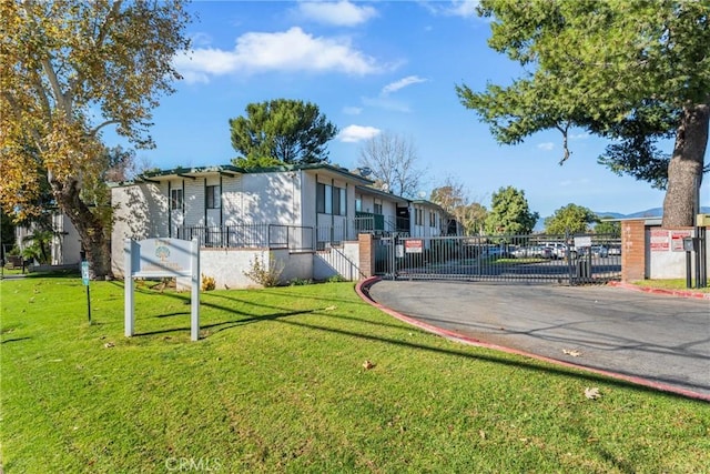 exterior space with a front yard