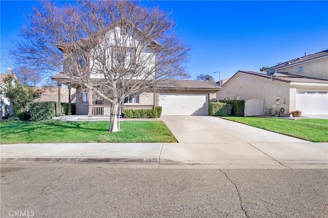 view of front of property featuring a front lawn and a garage