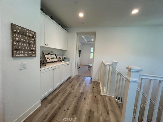 hallway featuring light hardwood / wood-style floors