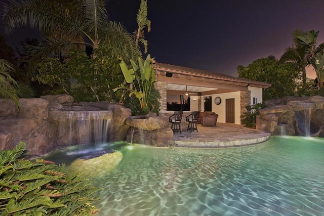 view of pool featuring pool water feature