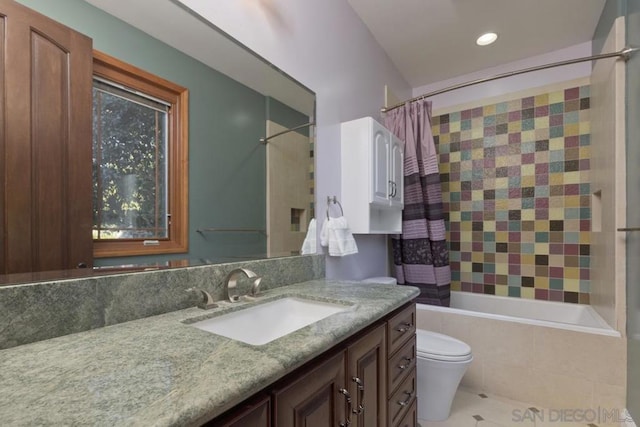 full bathroom with vanity, toilet, and shower / bath combination with curtain