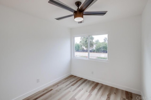 spare room with ceiling fan and light hardwood / wood-style floors