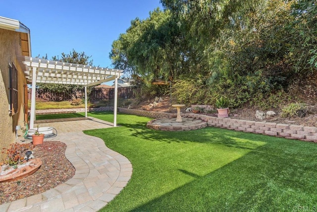 view of yard with a patio area and a pergola