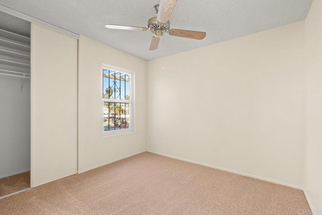 1403 Goff Ct, San Diego, CA 92114 - unfurnished bedroom featuring light colored carpet, a closet, a ceiling fan, a textured ceiling, and baseboards