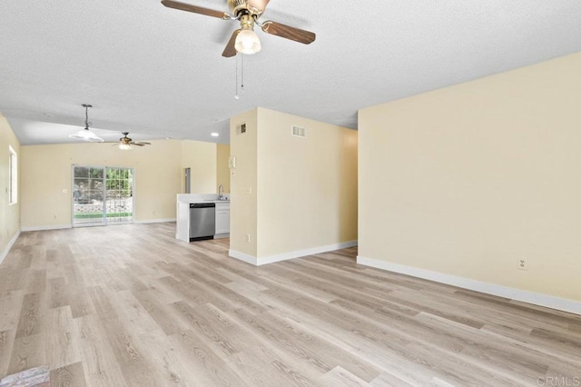 1403 Goff Ct, San Diego, CA 92114 - unfurnished living room with a ceiling fan, light wood-style flooring, baseboards, a sink, and a textured ceiling