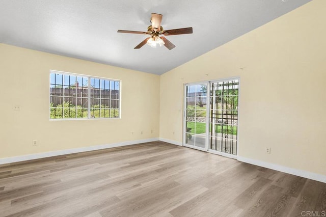 1403 Goff Ct, San Diego, CA 92114 - spare room featuring vaulted ceiling, wood finished floors, baseboards, and a ceiling fan