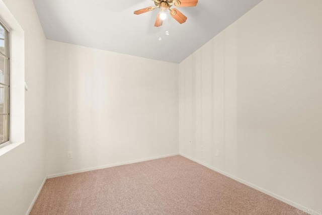 1403 Goff Ct, San Diego, CA 92114 - empty room featuring carpet, ceiling fan, vaulted ceiling, and baseboards